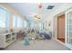 Bright sunroom with lots of natural light, neutral carpet, and french doors at 2972 Ponderosa Cir, Decatur, GA 30033