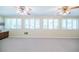 Sunroom with neutral carpet and lots of natural light from many windows at 2972 Ponderosa Cir, Decatur, GA 30033