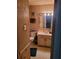 Functional bathroom with a vanity, toilet, and a large mirror at 3346 Northcrest Rd # A, Atlanta, GA 30340