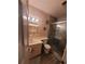 Bathroom featuring a vanity, toilet, and glass shower with gray-scale decor at 3346 Northcrest Rd # A, Atlanta, GA 30340