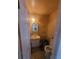 Small bathroom with neutral walls and flooring features white vanity and toilet at 3346 Northcrest Rd # A, Atlanta, GA 30340