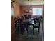 A dining room area with dining table and windows at 3346 Northcrest Rd # A, Atlanta, GA 30340