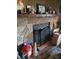 Stone fireplace with mantel, adding a rustic charm to the living space at 3346 Northcrest Rd # A, Atlanta, GA 30340