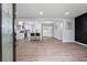 Spacious living room with wood floors and an open view of the modern kitchen at 1232 Andrews Dr, Marietta, GA 30062