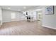 Bright living area with wood floors leading to a modern, eat-in kitchen at 1232 Andrews Dr, Marietta, GA 30062