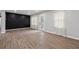 Light-filled living area with wood flooring and designer details throughout at 1232 Andrews Dr, Marietta, GA 30062