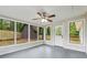 Bright sun room with multiple windows, offering views of the backyard and natural light at 1232 Andrews Dr, Marietta, GA 30062