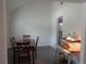 Bright dining room featuring a wooden table and chairs, and easy access to kitchen appliances at 1325 Sandlewood Ct, Lithonia, GA 30058