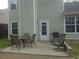 Back patio with outdoor seating and grill at 1325 Sandlewood Ct, Lithonia, GA 30058