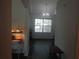 Light filled room with laminate flooring, a window, and neutral paint at 1325 Sandlewood Ct, Lithonia, GA 30058
