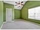 Spacious bedroom with a vaulted ceiling and a ceiling fan fixture above plush carpeting at 159 Molly Way, Mcdonough, GA 30253