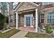 Close-up of the home's front porch, showing the brick facade and covered entrance at 159 Molly Way, Mcdonough, GA 30253