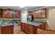 Charming kitchen with an island, stainless steel appliances, and beautiful dark wood cabinets at 159 Molly Way, Mcdonough, GA 30253