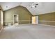 Large living area with high ceilings, and carpet flooring at 159 Molly Way, Mcdonough, GA 30253