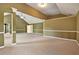 Spacious living room featuring high ceilings, neutral carpet, and decorative trim at 159 Molly Way, Mcdonough, GA 30253