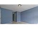Bedroom features plush carpeting and blue walls at 3937 Sautee Trl, Conley, GA 30288