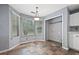 Bright dining area nook features natural light and tile flooring near the kitchen at 3937 Sautee Trl, Conley, GA 30288