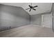 Main bedroom suite features vaulted ceilings, carpet, and a ceiling fan at 3937 Sautee Trl, Conley, GA 30288