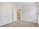 Bedroom featuring neutral carpet at 609 Alyssa Ct, Locust Grove, GA 30248