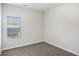Bedroom with window and neutral carpet at 609 Alyssa Ct, Locust Grove, GA 30248