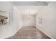 Elegant dining room with a modern chandelier and hardwood floors at 609 Alyssa Ct, Locust Grove, GA 30248