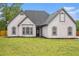 Charming single-story home with a well-maintained lawn and inviting curb appeal at 609 Alyssa Ct, Locust Grove, GA 30248