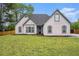 Charming single-story home with a well-maintained lawn and inviting curb appeal at 609 Alyssa Ct, Locust Grove, GA 30248