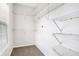 Spacious walk-in closet with carpeted floors and white wire shelving to maximize storage at 609 Alyssa Ct, Locust Grove, GA 30248
