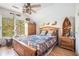 Charming bedroom with lots of natural light and unique rustic decorations at 125 Russell Rd, Lawrenceville, GA 30043
