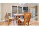 Cozy breakfast nook features a wooden table set by a window providing natural light at 125 Russell Rd, Lawrenceville, GA 30043