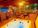 Outdoor deck with a hot tub and patio furniture, perfect for relaxation at 125 Russell Rd, Lawrenceville, GA 30043