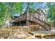 Multi-level deck and staircase connecting the house and the yard perfect for entertaining and recreation at 125 Russell Rd, Lawrenceville, GA 30043