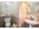 Stylish half bathroom with textured tile and modern sink fixtures at 125 Russell Rd, Lawrenceville, GA 30043