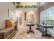 Spacious living room with high ceilings, arched doorways, tile floor, and ample natural light at 125 Russell Rd, Lawrenceville, GA 30043