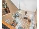 Spacious living room with a fireplace, tile flooring, and a high ceiling at 125 Russell Rd, Lawrenceville, GA 30043
