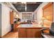 Home office with a large desk and rustic decor, perfect for productivity at 125 Russell Rd, Lawrenceville, GA 30043