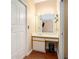 Bathroom featuring a vanity with mirror and a closet at 2161 Peachtree Ne Rd # 402, Atlanta, GA 30309