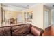 Living area with hardwood floors, a sofa and a view of dining and kitchen areas at 2161 Peachtree Ne Rd # 402, Atlanta, GA 30309