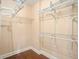 Walk-in closet with wood floors and shelving at 2161 Peachtree Ne Rd # 402, Atlanta, GA 30309