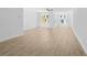 Spacious living room with multiple windows, ceiling fan, and modern flooring at 2832 Evanshire Ave # 112, Duluth, GA 30096
