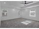 A bedroom with three windows, recessed lighting, crown molding, and ceiling fan at 4066 Wild Orchid Ln, Loganville, GA 30052