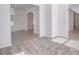 Open entryway featuring wood-look tile, neutral walls, and modern light fixture at 4066 Wild Orchid Ln, Loganville, GA 30052