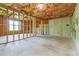 Unfinished basement with concrete floor, concrete walls, insulation and window at 4437 James Wade Dr, Snellville, GA 30039