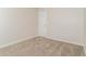 Cozy bedroom with plush carpeting, a neutral color palette, and ample space for relaxation at 4437 James Wade Dr, Snellville, GA 30039