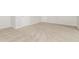 Bedroom featuring neutral walls, plush carpeting, and white baseboards creating a cozy space at 4437 James Wade Dr, Snellville, GA 30039