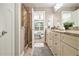 Light and bright bathroom with granite countertop, neutral cabinets, and walk-in shower at 4922 Summer Wind Dr, Buford, GA 30519