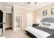 Bedroom featuring an ensuite bathroom, providing convenience and privacy in a cozy, carpeted space at 4922 Summer Wind Dr, Buford, GA 30519