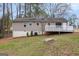 Backyard features nice deck, and well-maintained lawn at 5700 Tracy Dr, Mableton, GA 30126