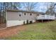 Home and backyard with deck and nice lawn, perfect for outdoor at 5700 Tracy Dr, Mableton, GA 30126