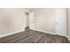 Spacious bedroom with new flooring and neutral colors, providing a relaxing atmosphere at 5700 Tracy Dr, Mableton, GA 30126
